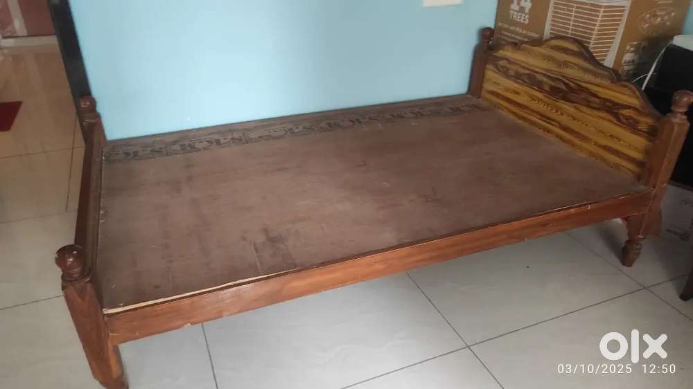 4 feet by 4.5 feet bed with teak wood frame and ply sheet