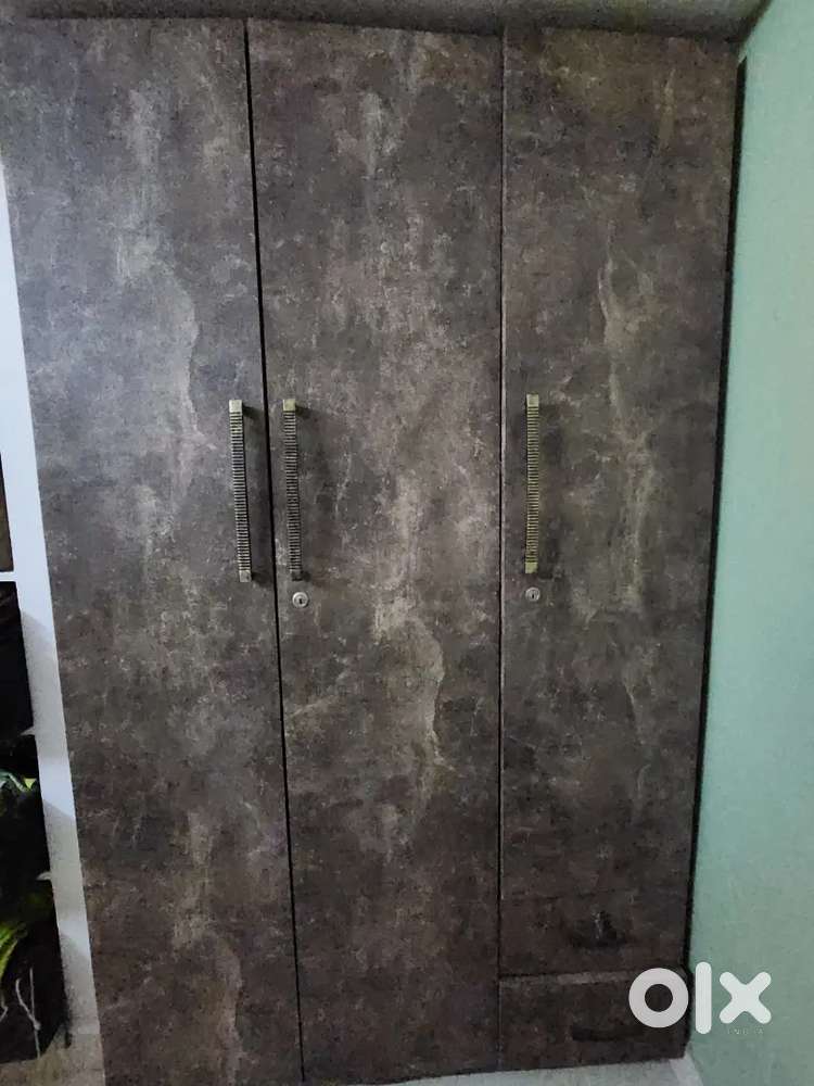 3 door wardrobe with beautiful finish and brass handles