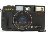 Yashica MF-2 Super DX 35mm Film Camera NEW  and Instruction Manual