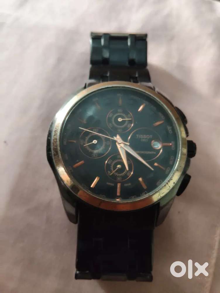 Tissot brown gold chronograph watch