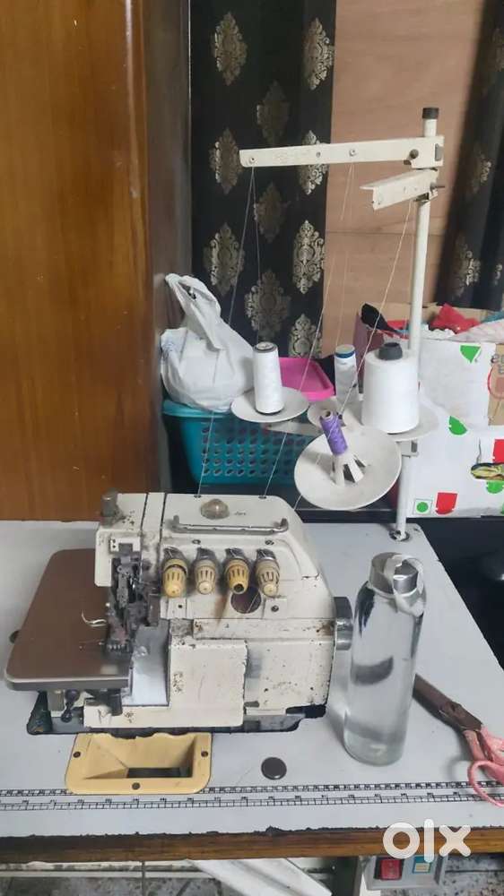 Good condition stitching machine and 4 thread overlock machine