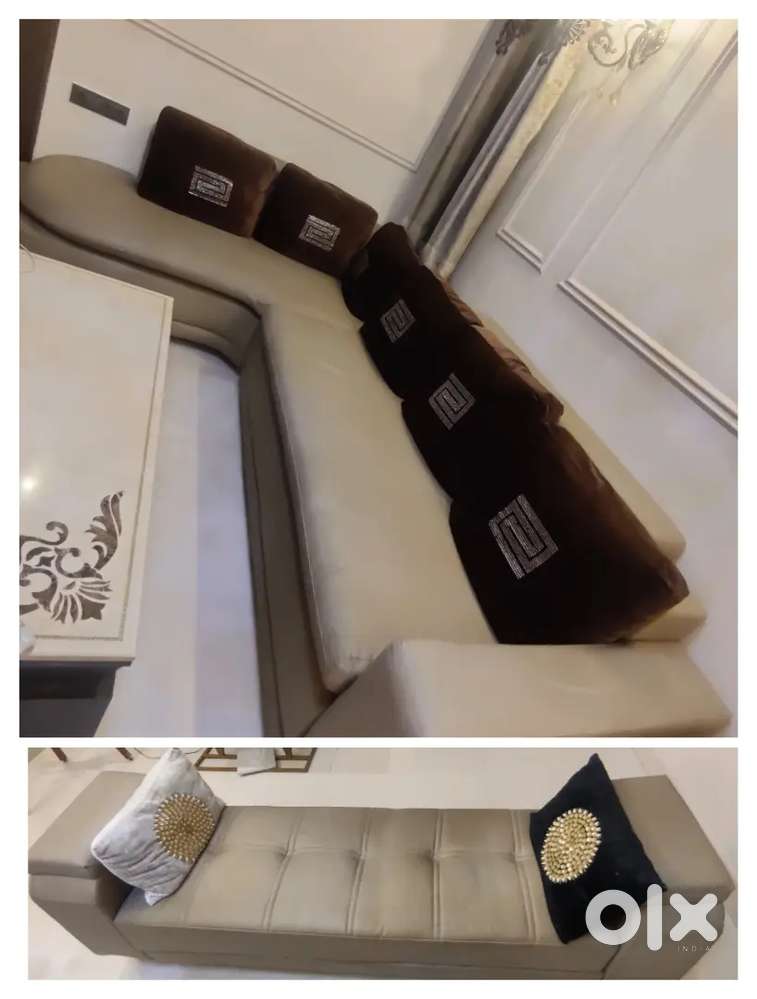 L shaped sofa with setty