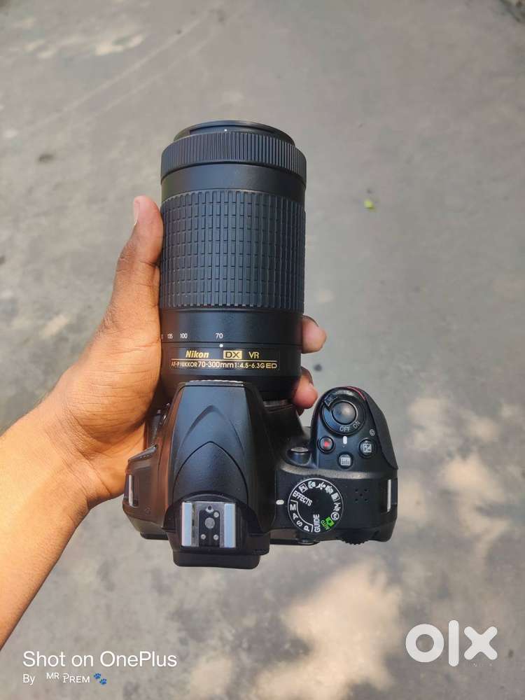 Nikon D3400 camera and lens with two batteries