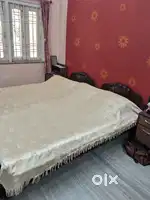 Two piece wooden bed  with two rilaxon