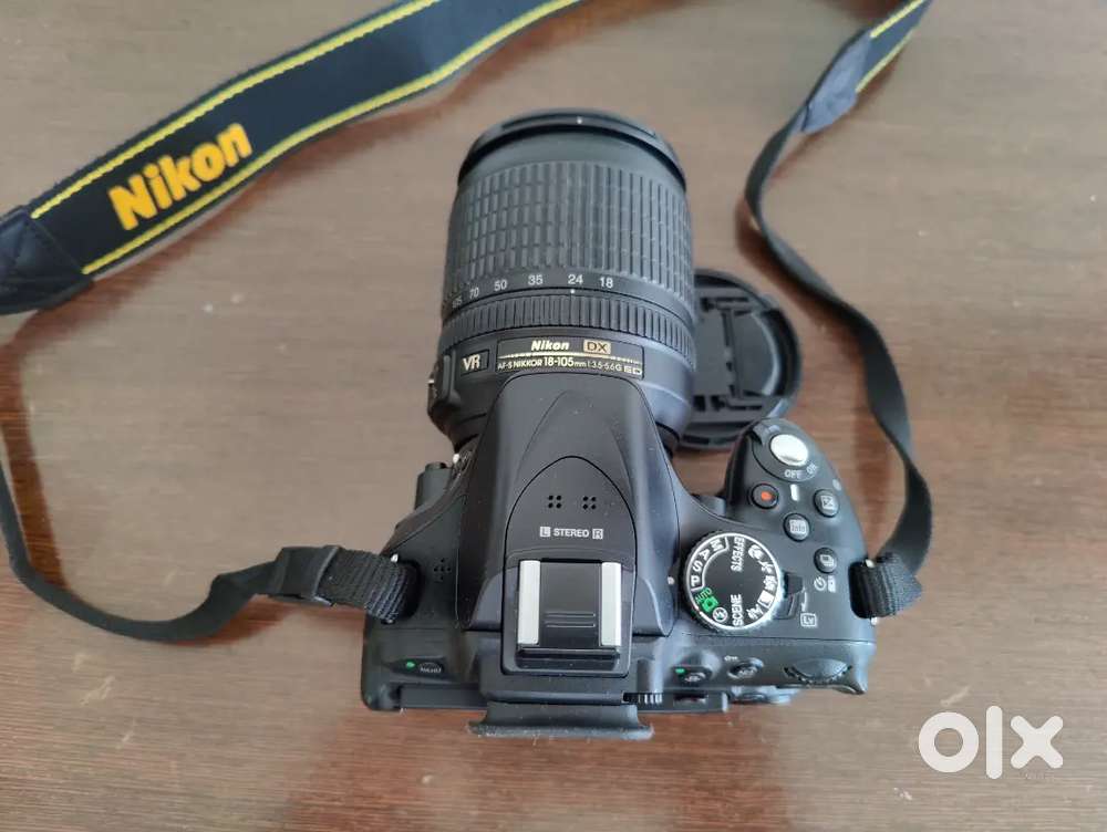 Like new - Nikon D5200 DSLR camera and 18-105 mm lens for sale
