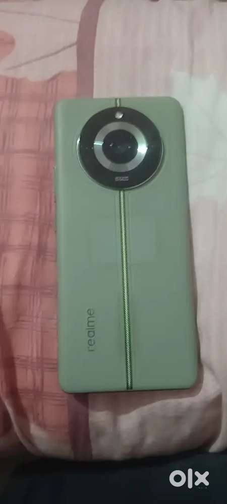 Realme 11 pro 5g. 256 Gb Rom. 8+4 Gb Ram 5000 mah battery.