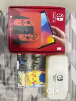 NINTENDO SWITCH OLED WITH ALL ACCS, TWO GAMES AND THE CARRYING CASE