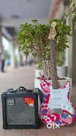 Fender squier electric guitar and roland amplifier