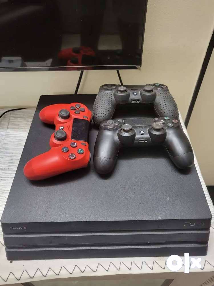 PS4 Pro 1TB + 3 Dualshock Controllers + Charging Dock