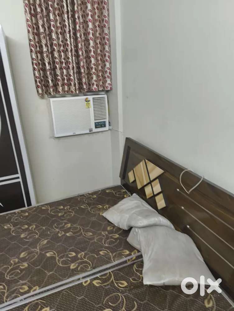 1 Room is empty in 2 bhk with AC and attached lath bath .