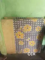 Holding bed