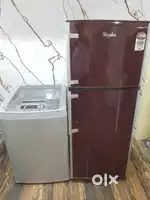 Whirlpool double door refrigerator and lg top load washing machine $