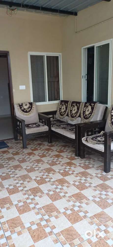 Teak wood ,5 seater sofa, with well maintained cushions