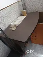 Table counter, chairs, paper plate machine