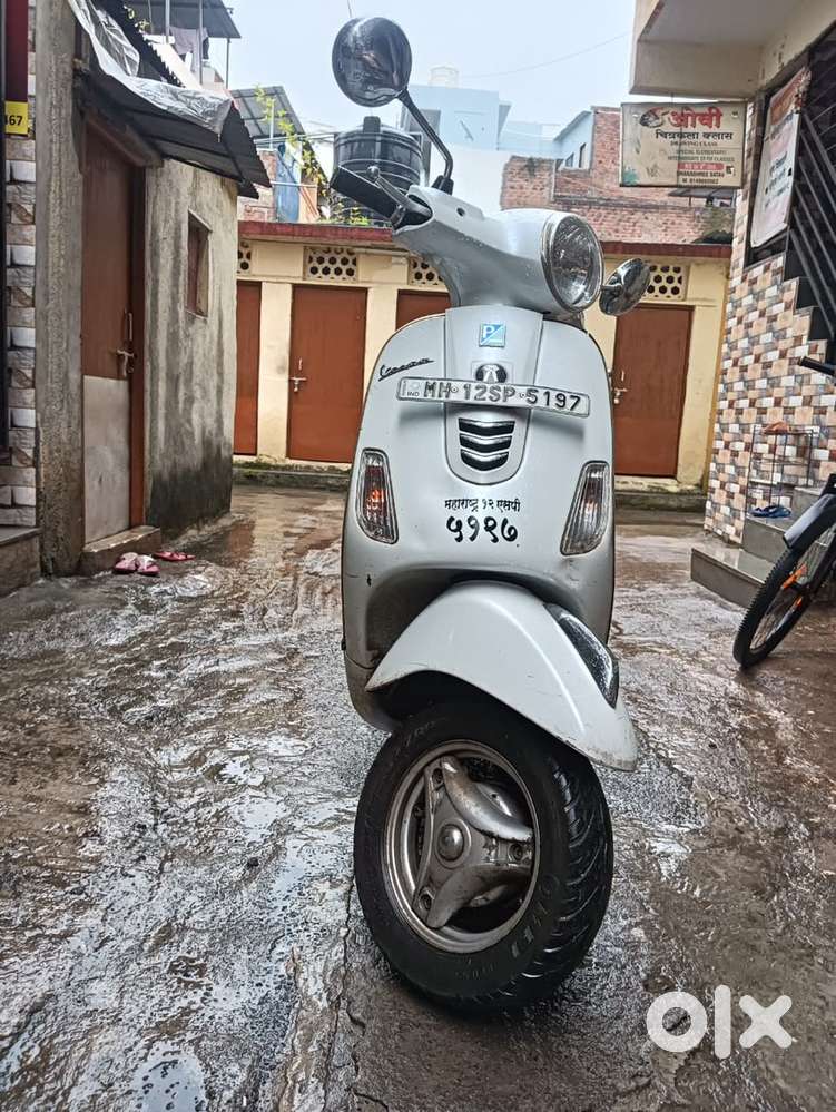 Pearl white Vespa