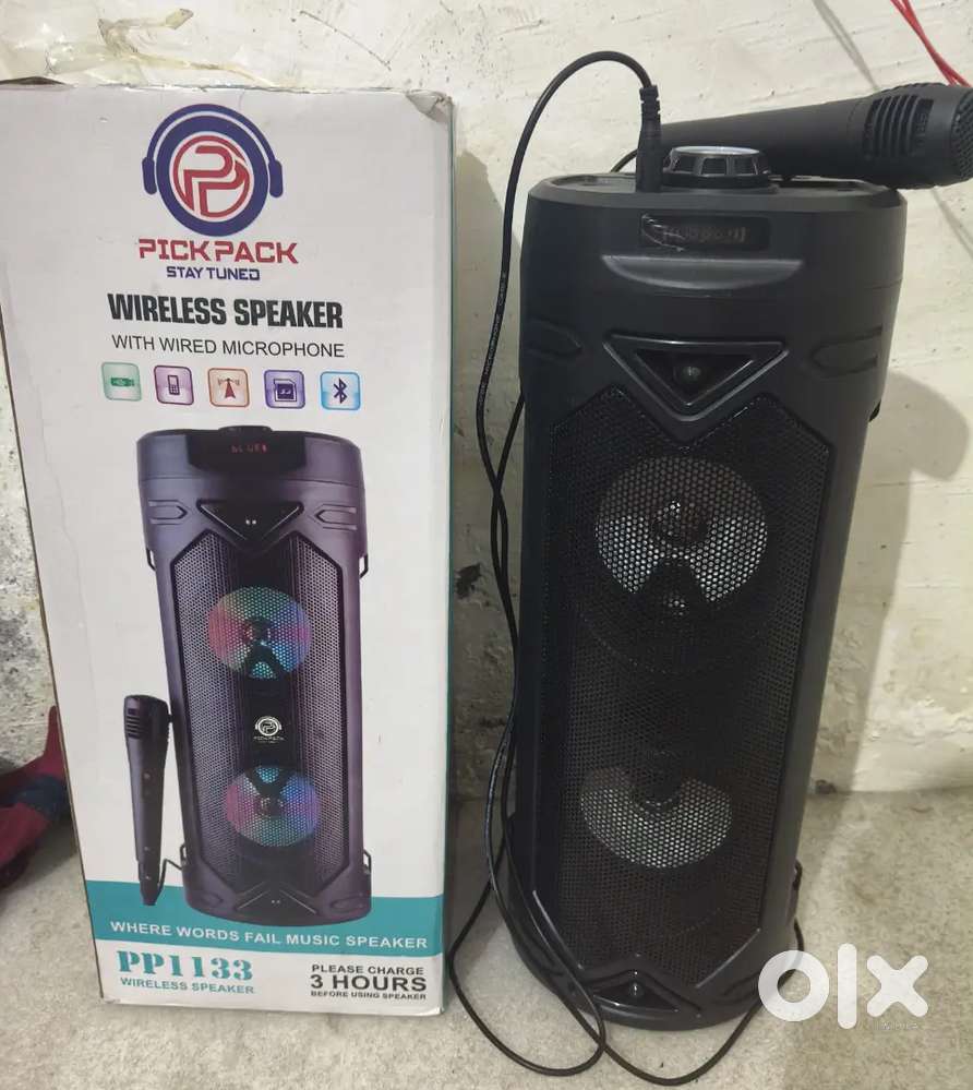 WIRELESS SPEAKER WITH WIRED MIC ( IT IS BOX PACK AND NEW )
