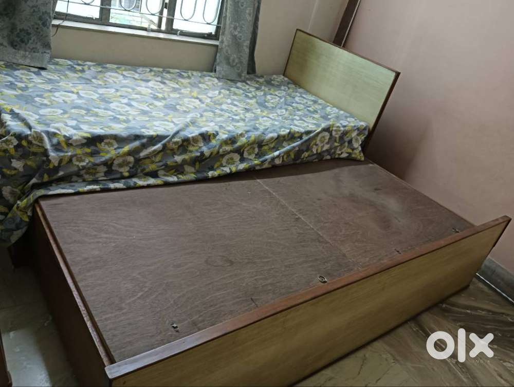 Foldable double bed with storage