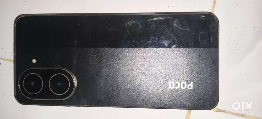 Phone: model poco C71 black colour phone useing 2 mount