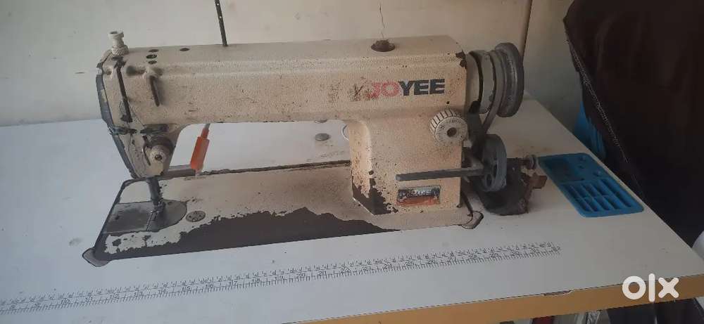 Sewing machine motor operated