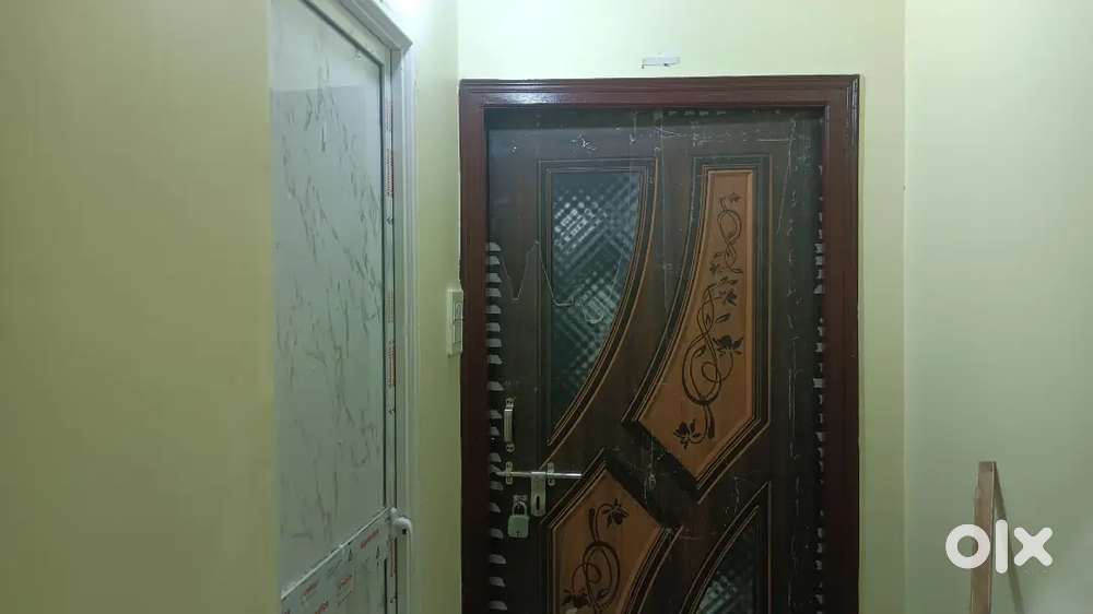 A room with bathroom attached