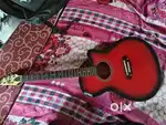 BRAND NEW YEMAHA GUITAR (PRICE IS NEGOTIABLE) URGENT SELL