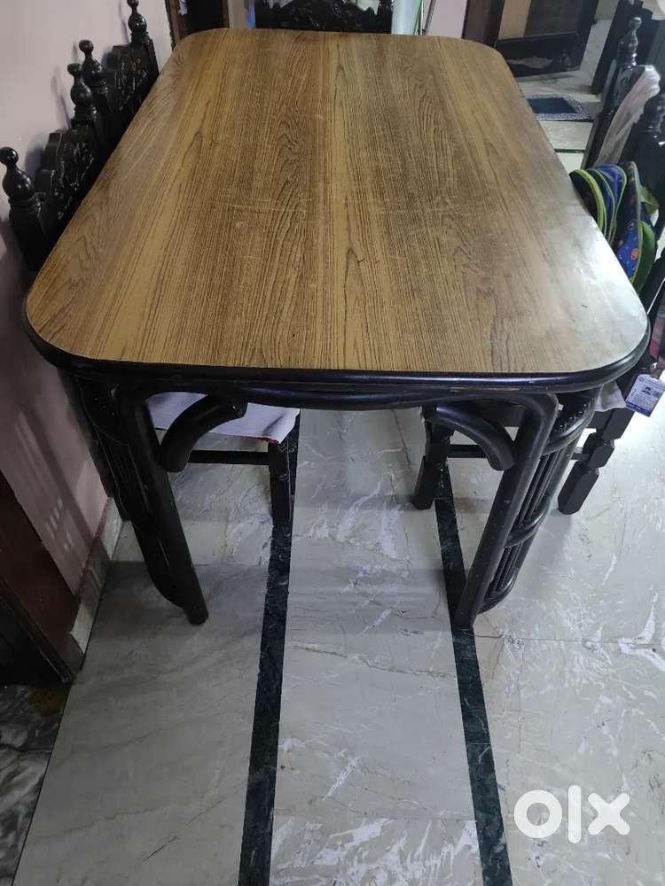 4 seater wooden dining table