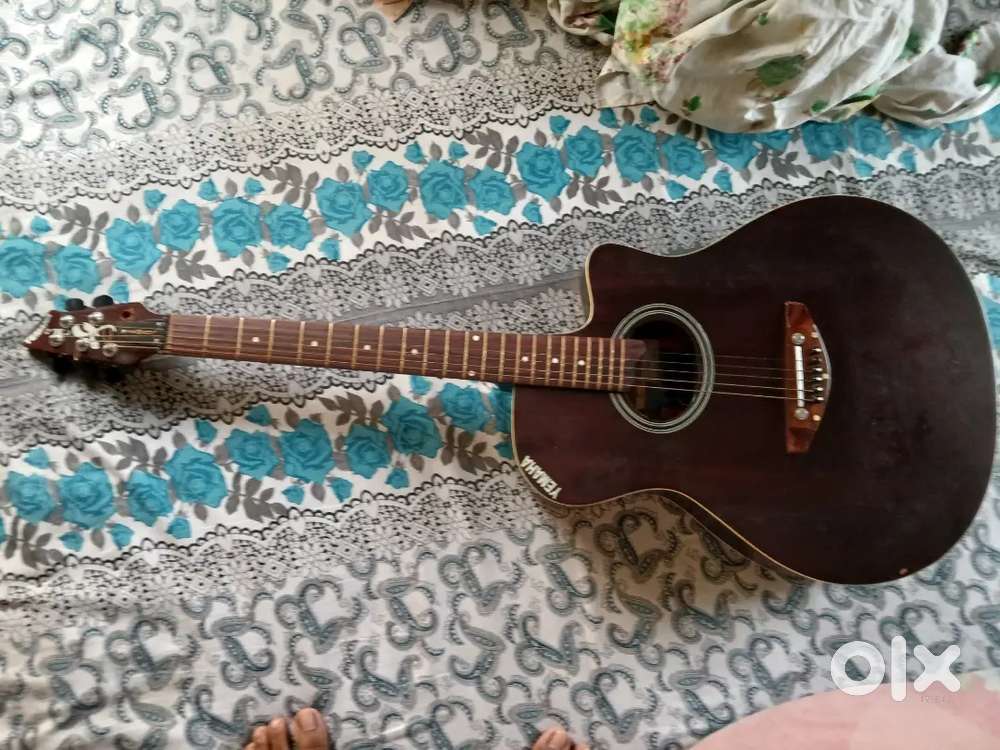 A Yamaha guitar with bag