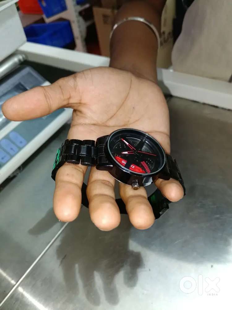 Spining car wheel watch