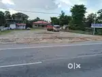 Earth filling area with boundary wall near NH 27.
