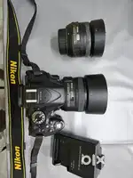 Nikon d5200. 50mm 1.8G. 35mm 1.8G. Like new.