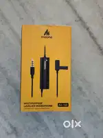 Branded microphone with stand.