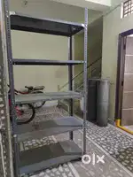 Steel racks iron. Shop purpose racks. 4 new racks.1 old rack. Total 5