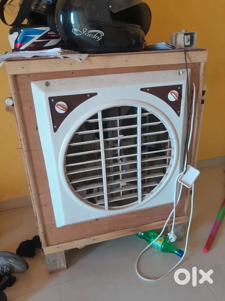 2 coolers, 1 metalic and 1 wooden.