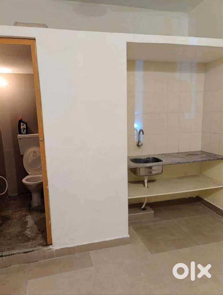 Well Ventillated BATCHELOR ROOM WITH bathroom and Kitchen platform