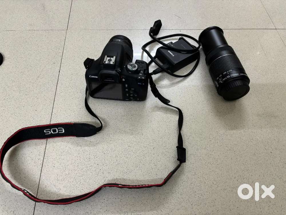 Canon 1500D DSLR + 18-55 and 55-250mm lenses