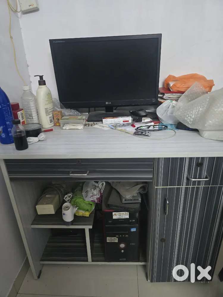 Computer table with computer CPU and mouse