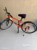Sparingly used Rockrider 24 inch well equipped cycle for kids