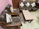 5 seater sofa without centre table 8,000 with centre table 12,000