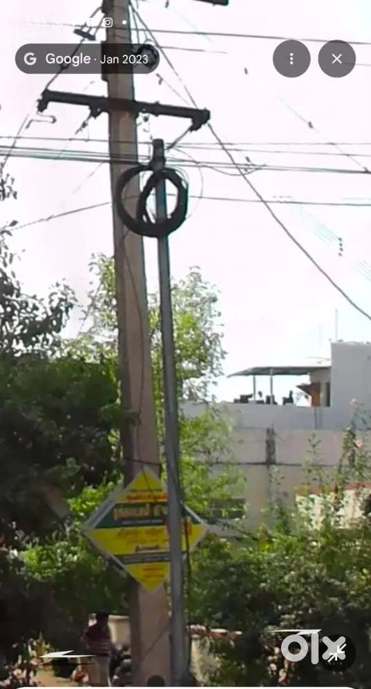 Behind one building to Trichy road