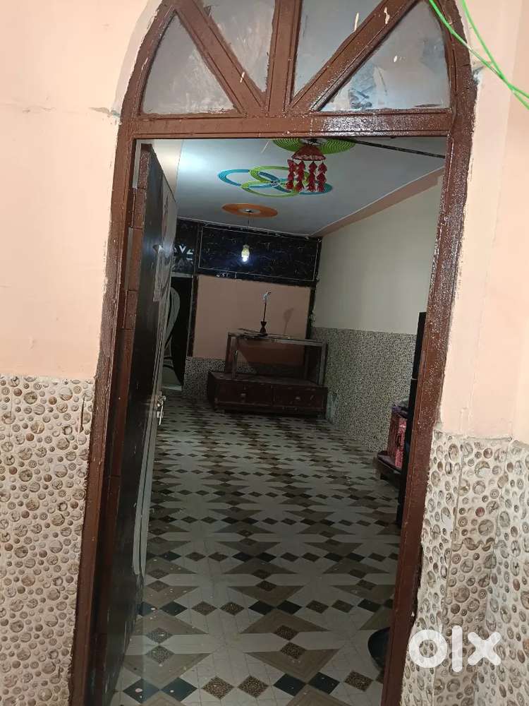 Corner house with car parking