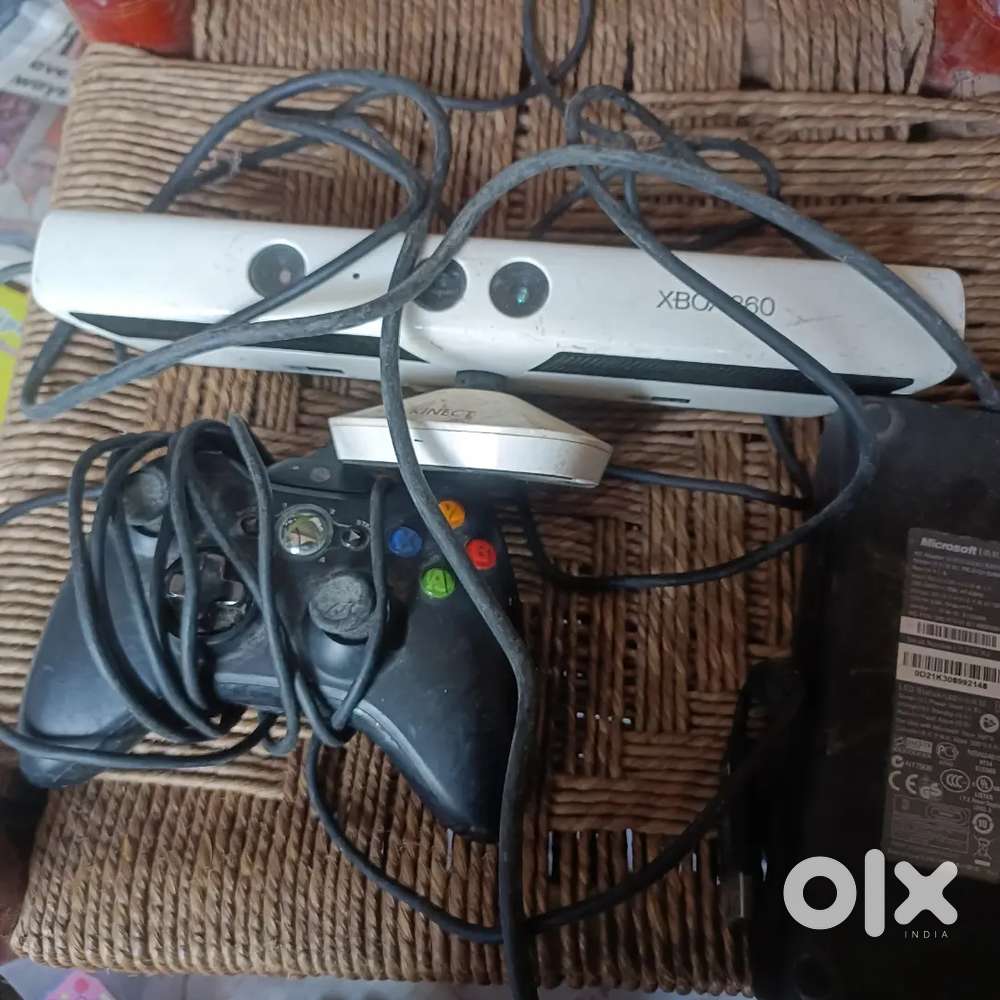 X box 360 kinect console and power adapter