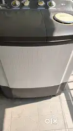 LG Washing Machine 7 kg top load 18 months old in good condition