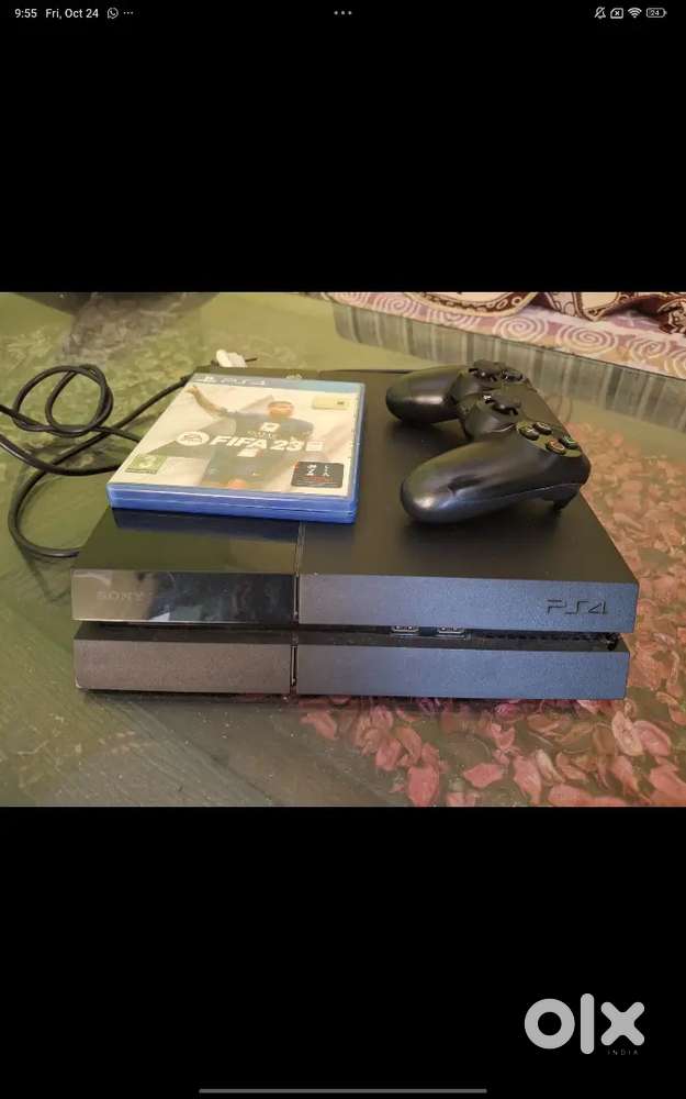 Ps4 for sale with gta 5, uncharted, and fifa 2023