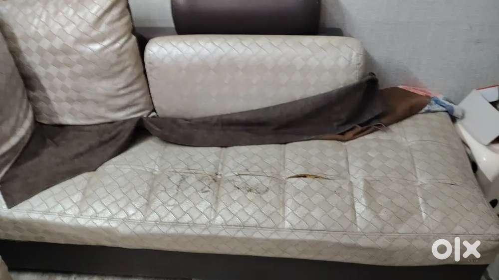 7 seater sofa with 2 puffy