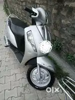 Suzuki Access 125 For sell in running condition .