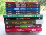 New NEET Guides with free question papers at lower price.