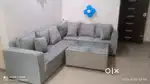 Brand New 6 Seater sofa with Glass top table.