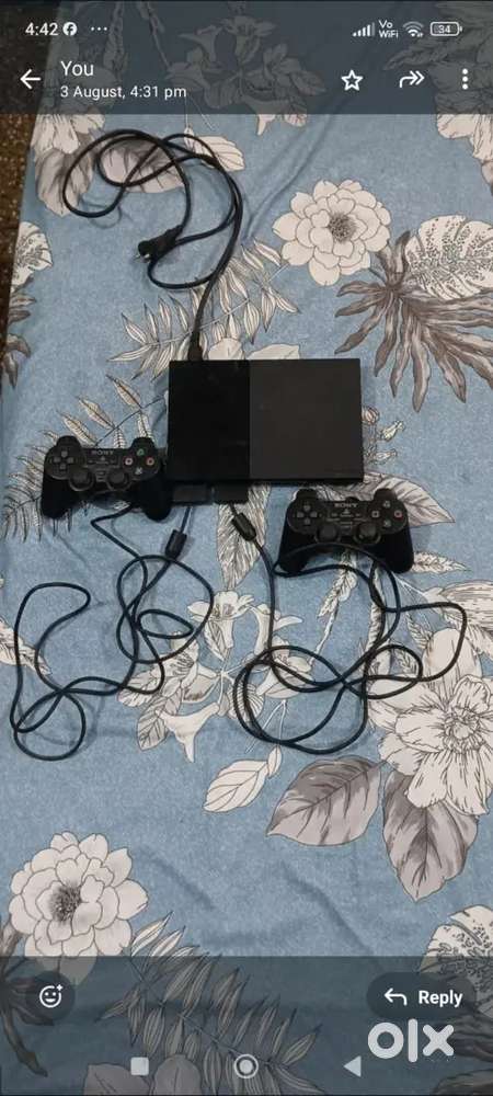 Sony PS2 slim consol with 2 control +Medal of honor game