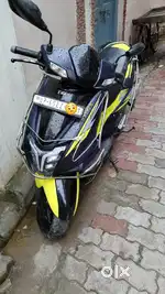 Tvs Ntroq 125Xt neon color top model