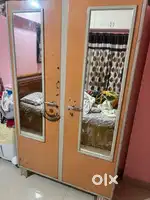 L shape Sofa and steel double door almirah